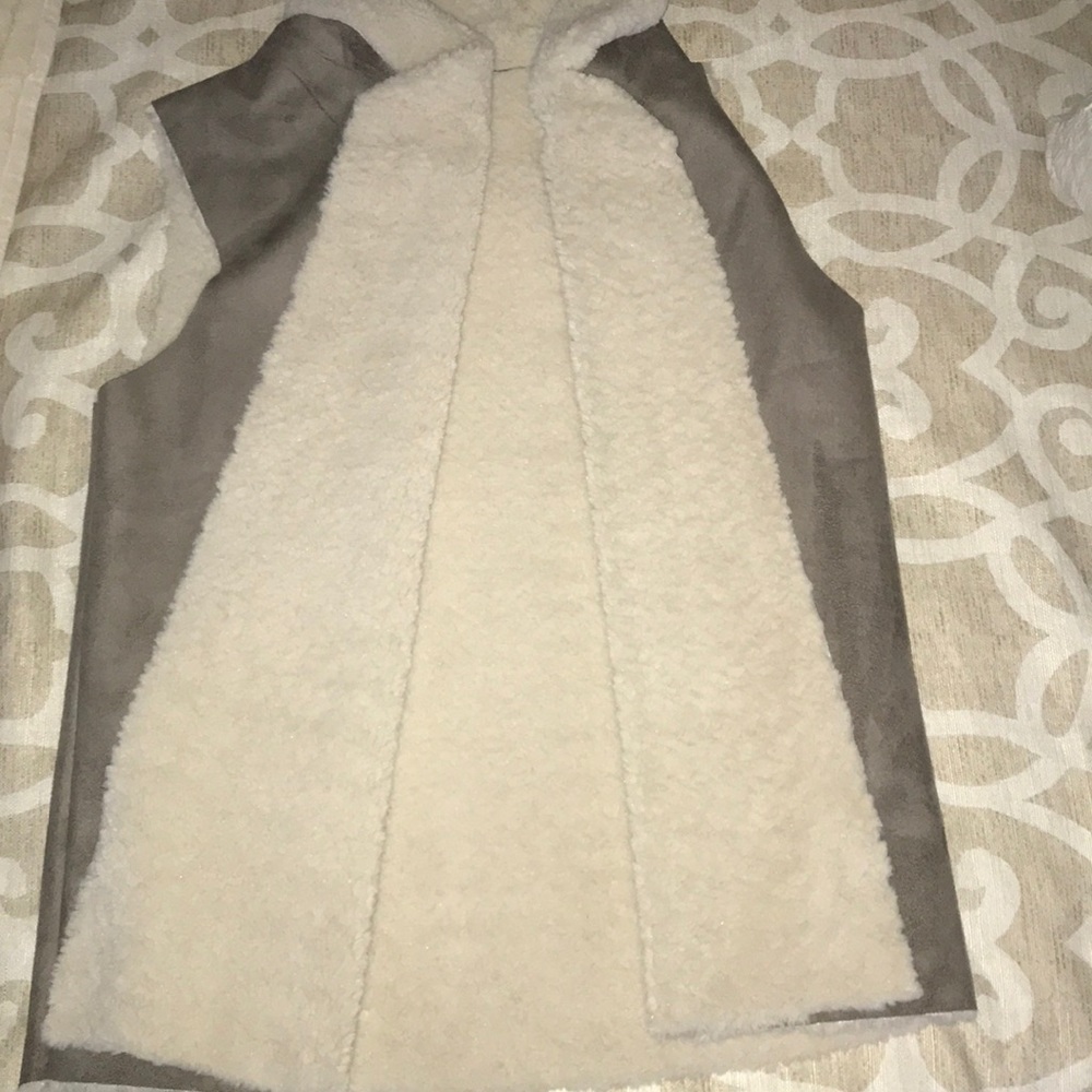 Only worn once fur vest